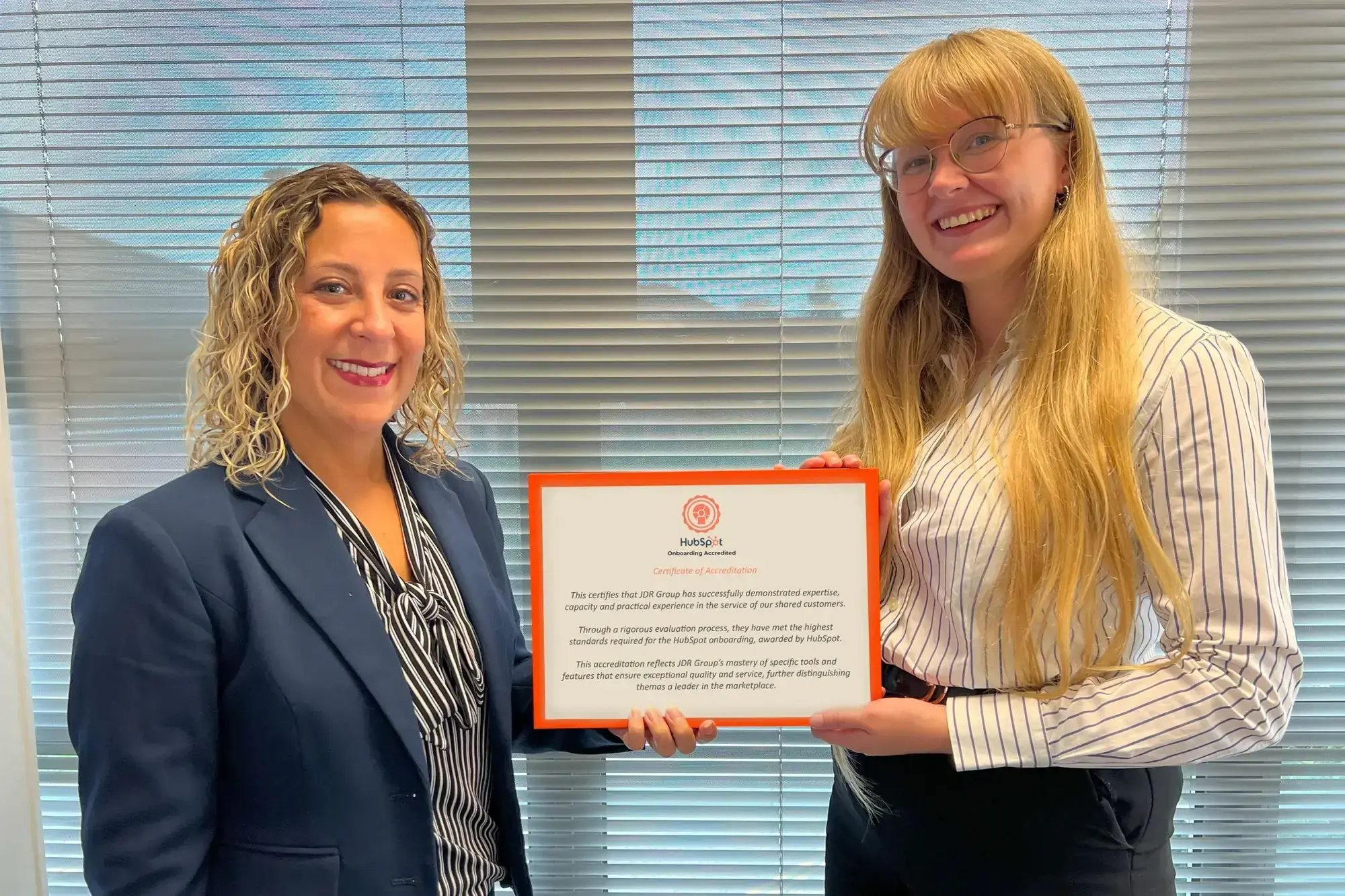 Leanne-and-Emma-Holding-HubSpot-Onboarding-Accreditation-Award