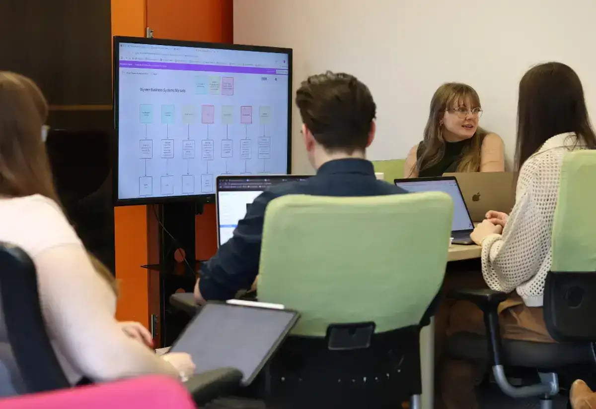 Team-Meeting-With-Laptops