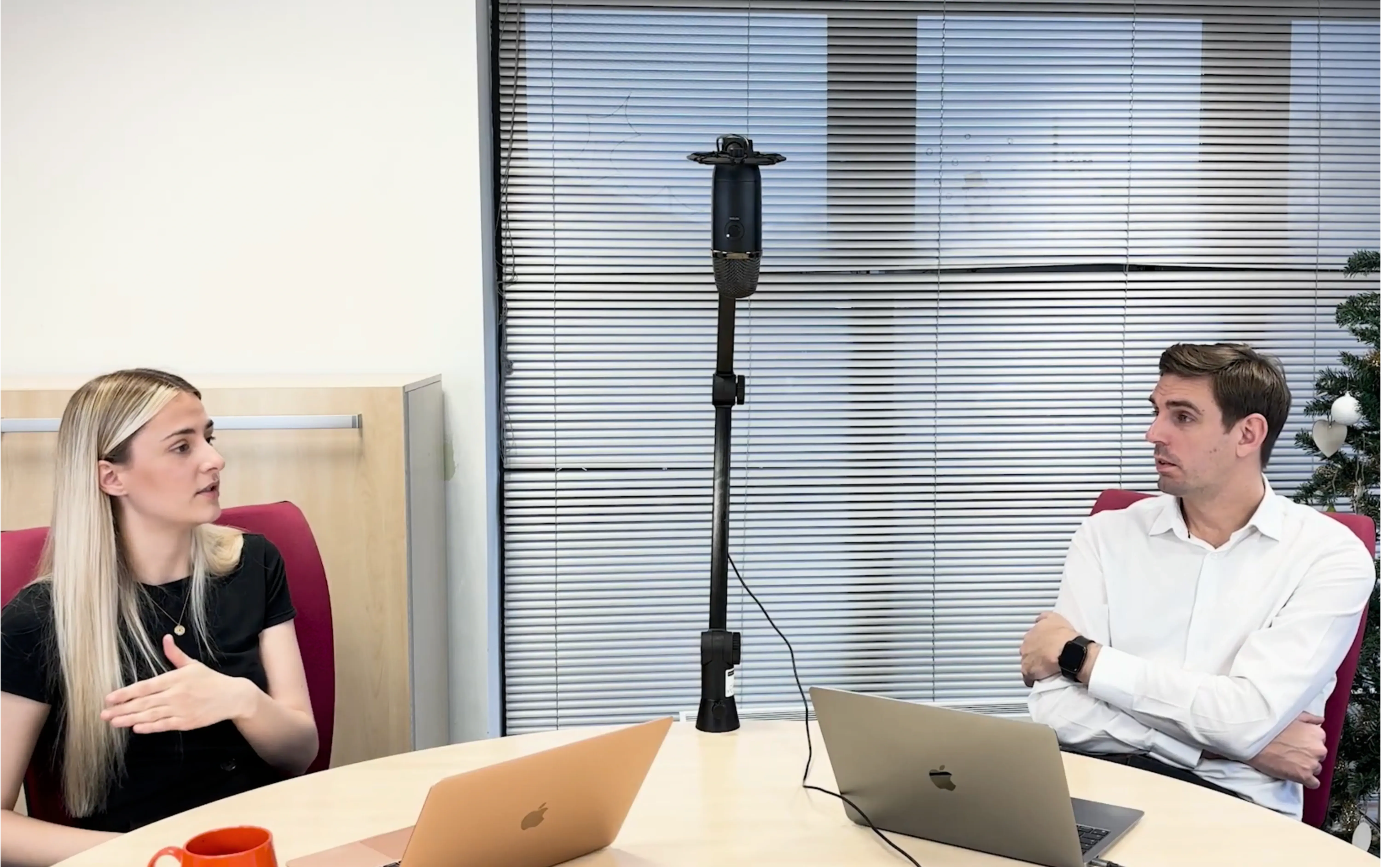 Charlotte Thornton and Andy Gibbins recording a Digital Prosperity podcast episode, discussing building better websites using HubSpot.