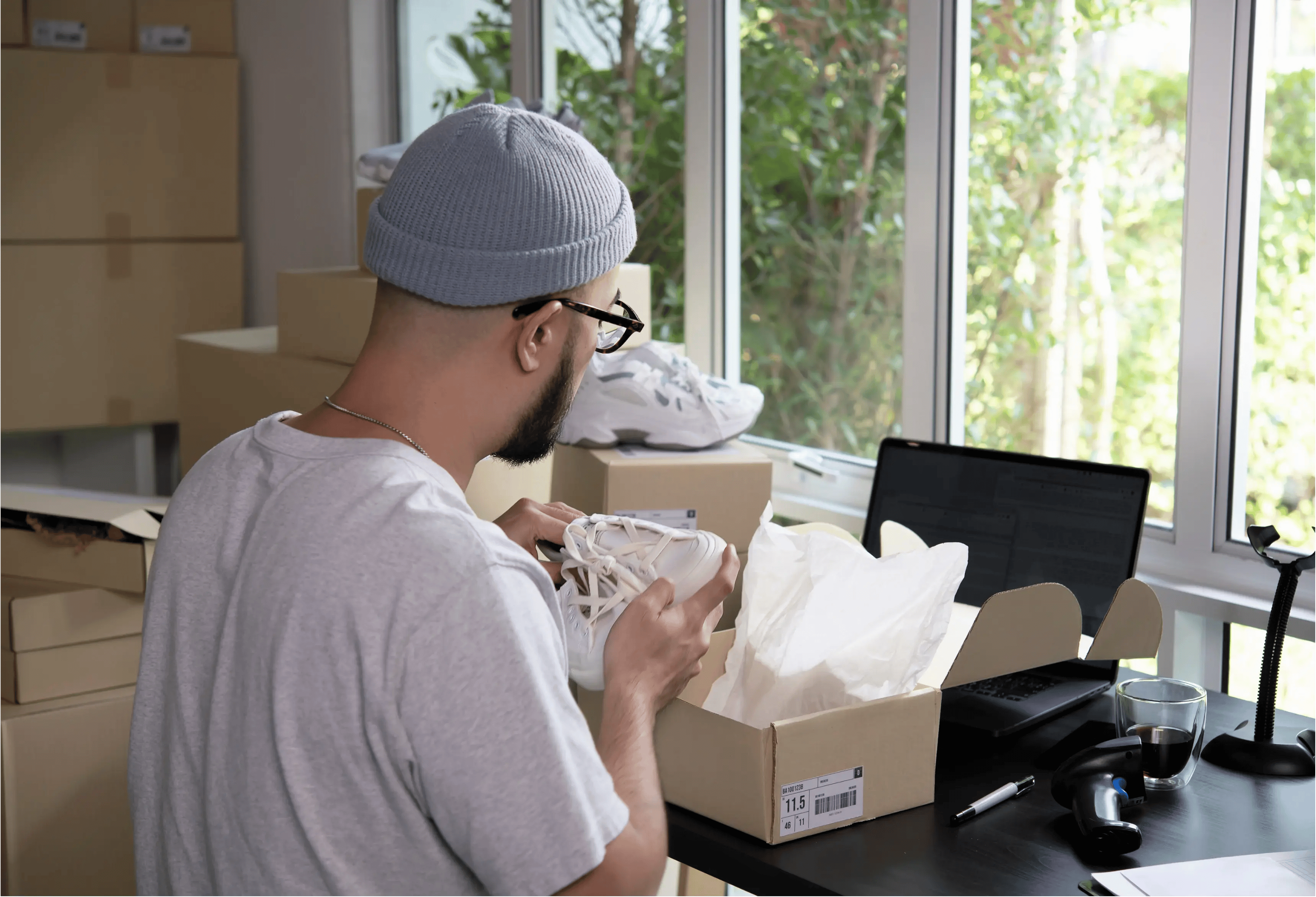 E-Commerce seller packing orders. 