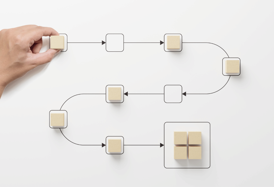 Graphic with cubes along a line representing how a Hubspot workflow can streamline tasks.