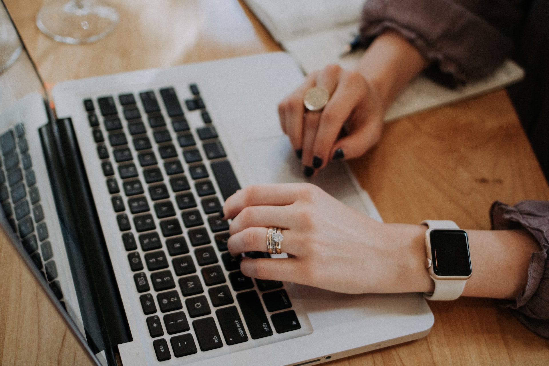 A businesswoman on her laptop, developing a proven sale process for her small business to generate new leads. 