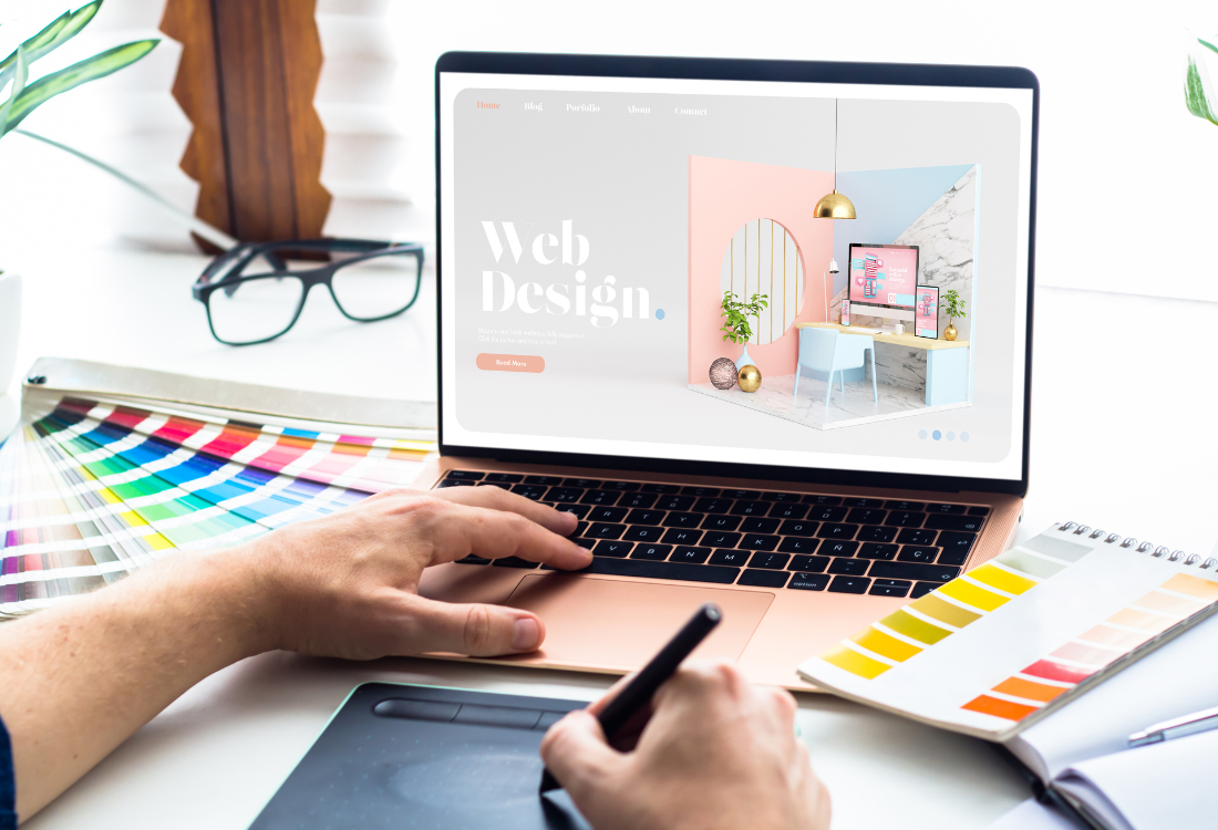 A designer actively engaged in revitalising a brand's digital presence through implementation of expert web design.