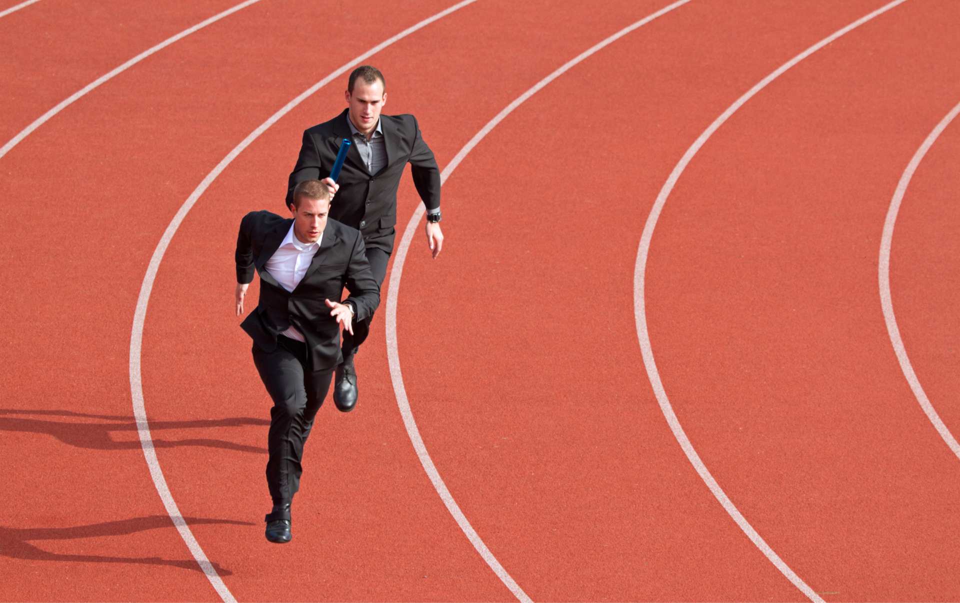 Two business men racing towards business growth with the winner succeeding due to understand his ideal customers and digital marketing strategy