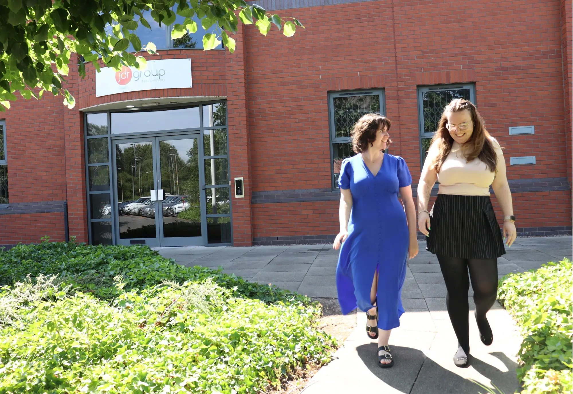 Ruby and Ellis outside the JDR office in Derby