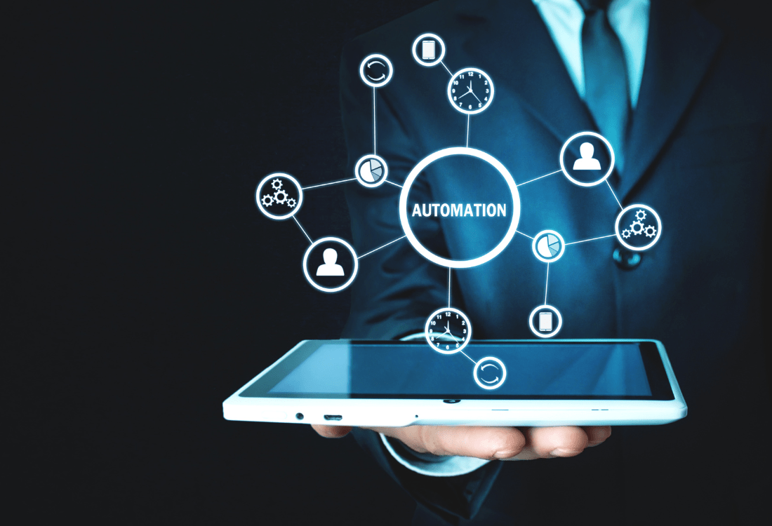 A business person using different automations as part of his marketing strategy. 