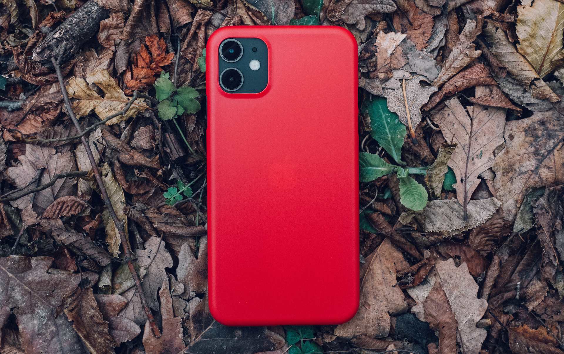 An Apple phone with a bright phone case within leaves able to be differentiated among different brands through effective marketing