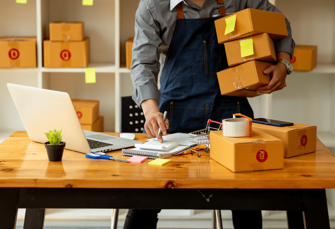 An SME manager coordinates efficient package handling and logistics, highlighting the role of elite HubSpot partners in streamlining business processes for enhanced SME management that leads to sustained growth.