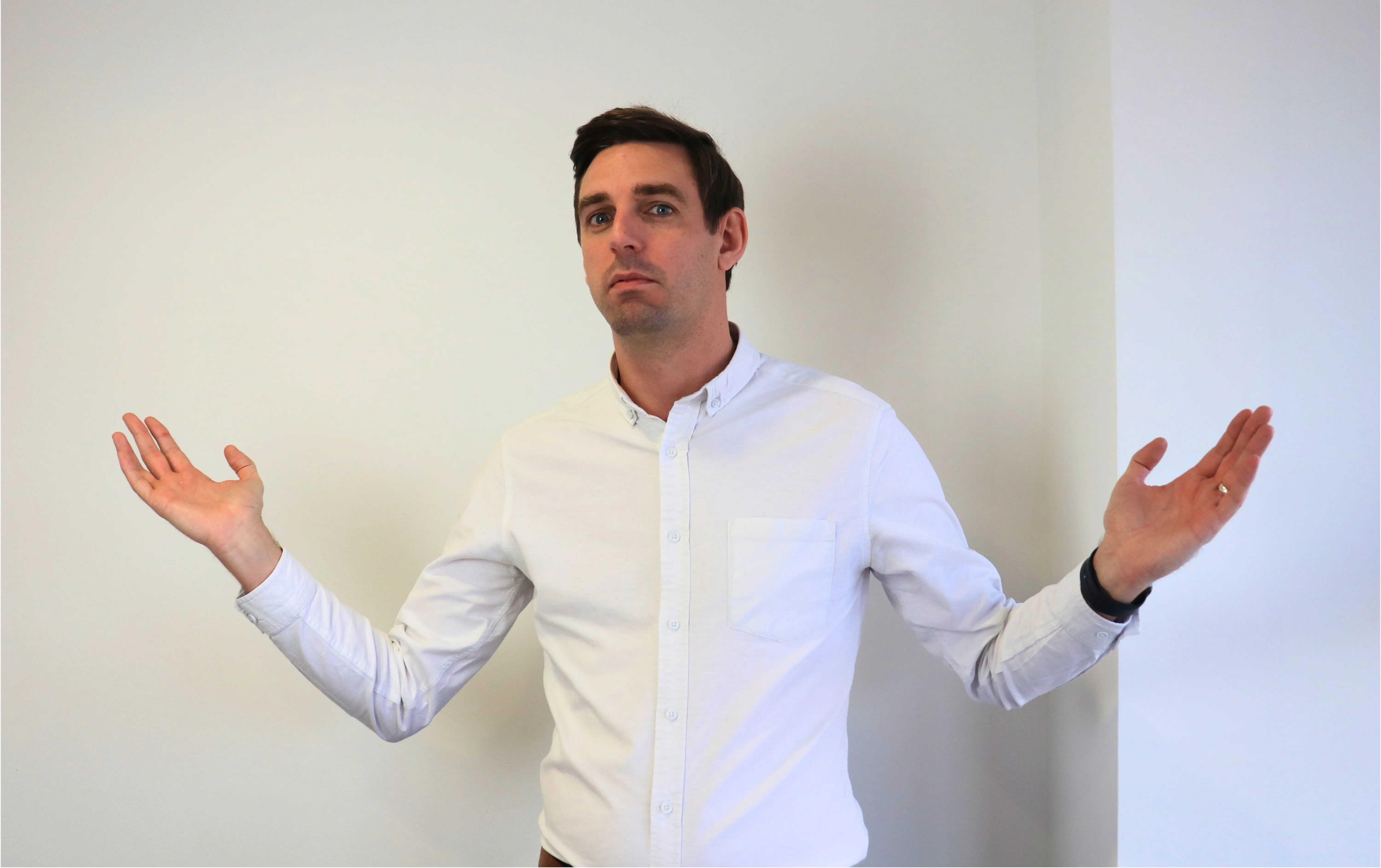 Andy from JDR showing a client a list of the best reasons to use Bluesky. 