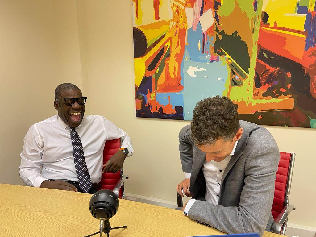 Founder David Roberts and Director Will Williamson laughing as they record a Hubspot CRM podcast