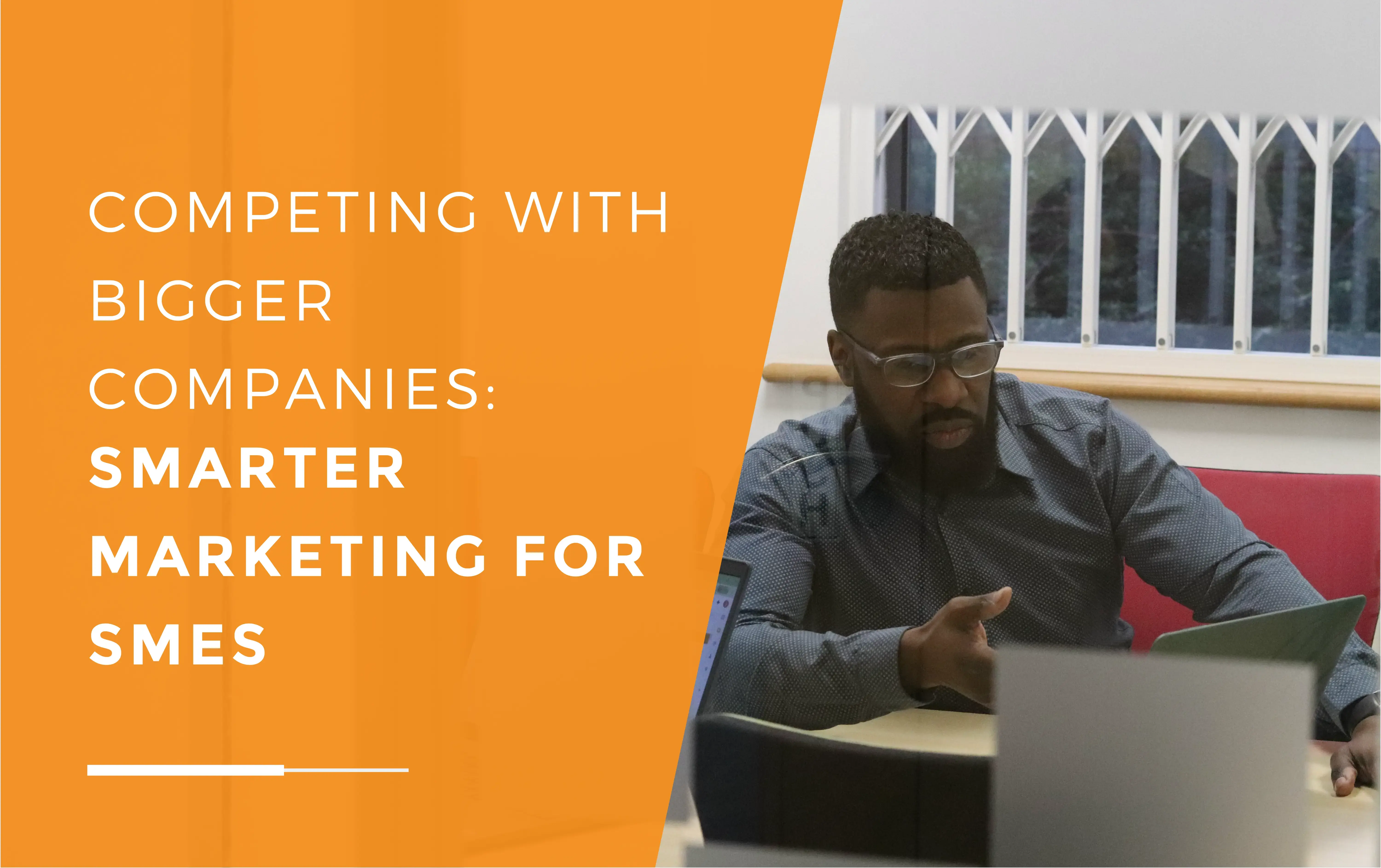 Dan in a meeting talking through an inbound marketing strategy to help an SME compete with a bigger company.