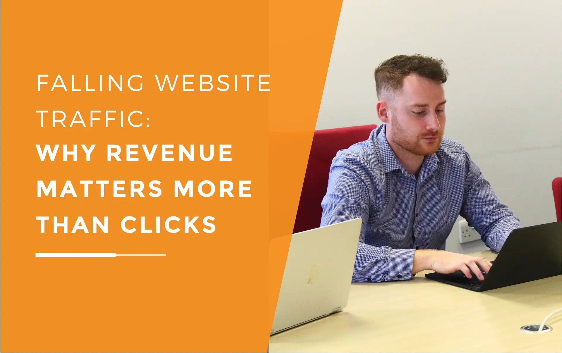John looking at his laptop screen and typing during a meeting about falling website traffic.