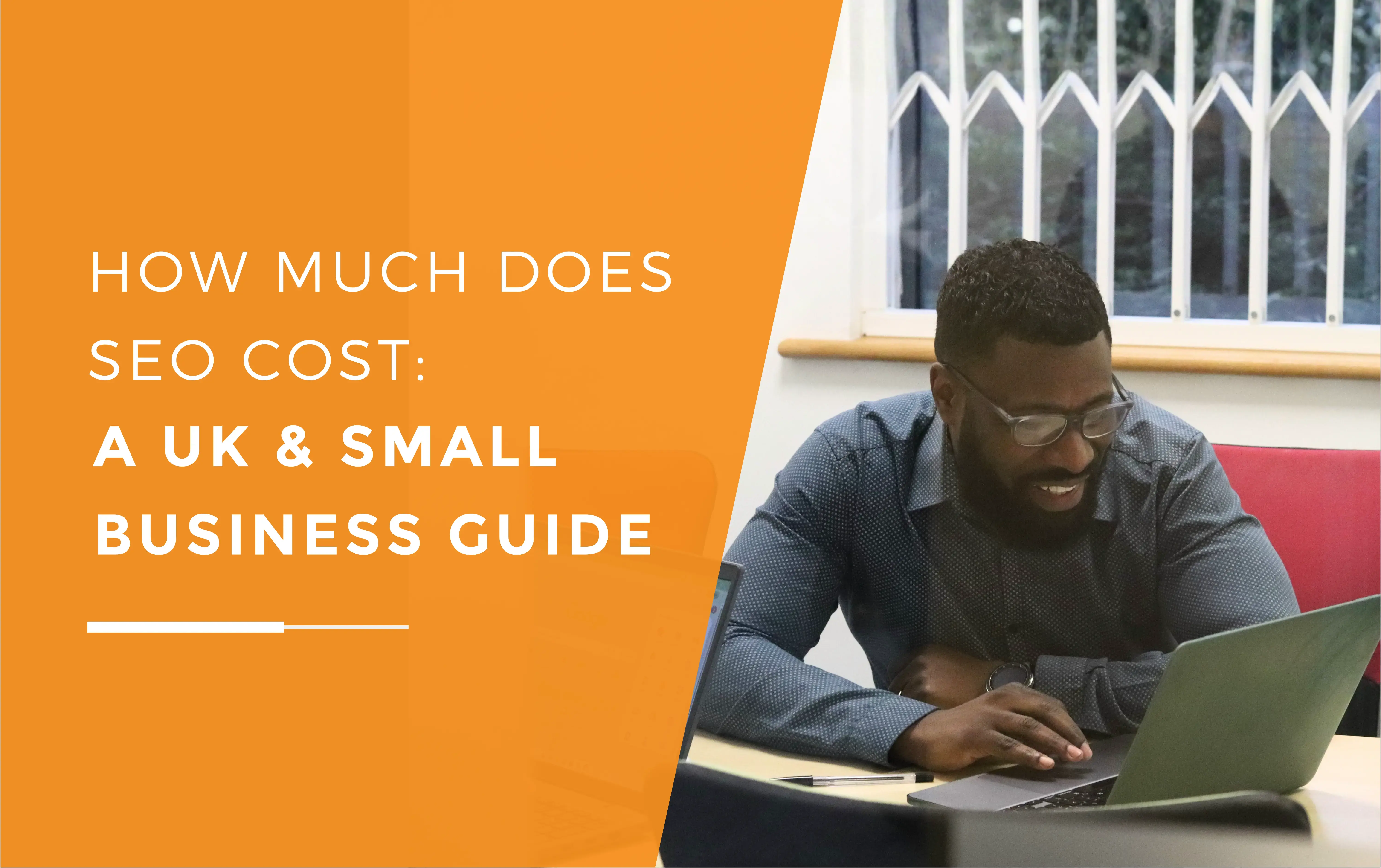 Dan scrolling on his laptop while laughing during a meeting about the cost of SEO.