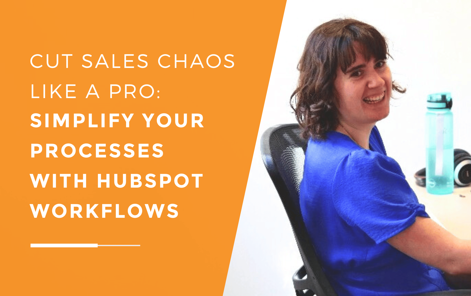 Smiling Ruby at her desk using a computer, representing streamlined sales processes with HubSpot workflows