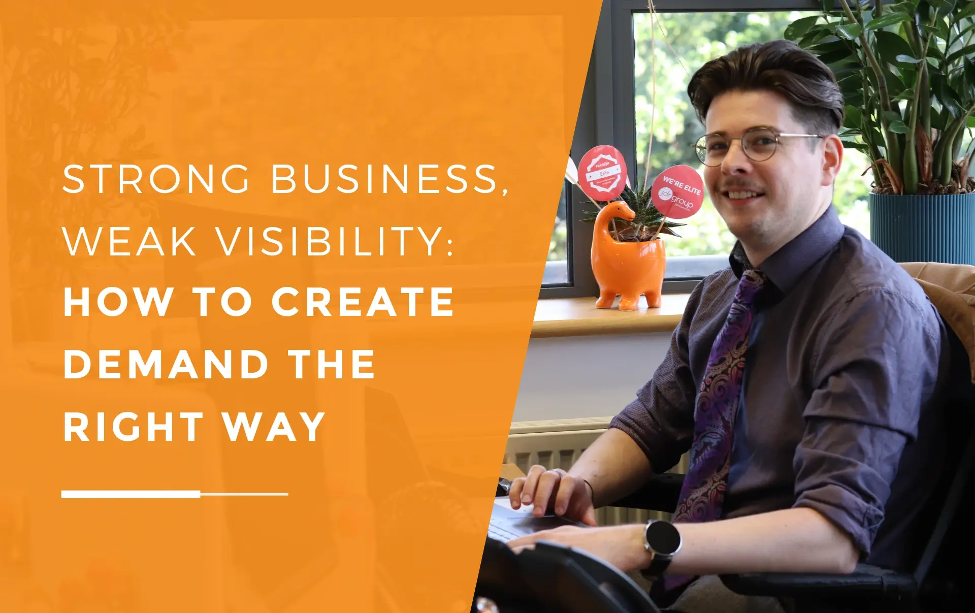 John from JDR Group working at his desk, representing how SMEs can build visibility and create demand when their business isn’t widely known yet.