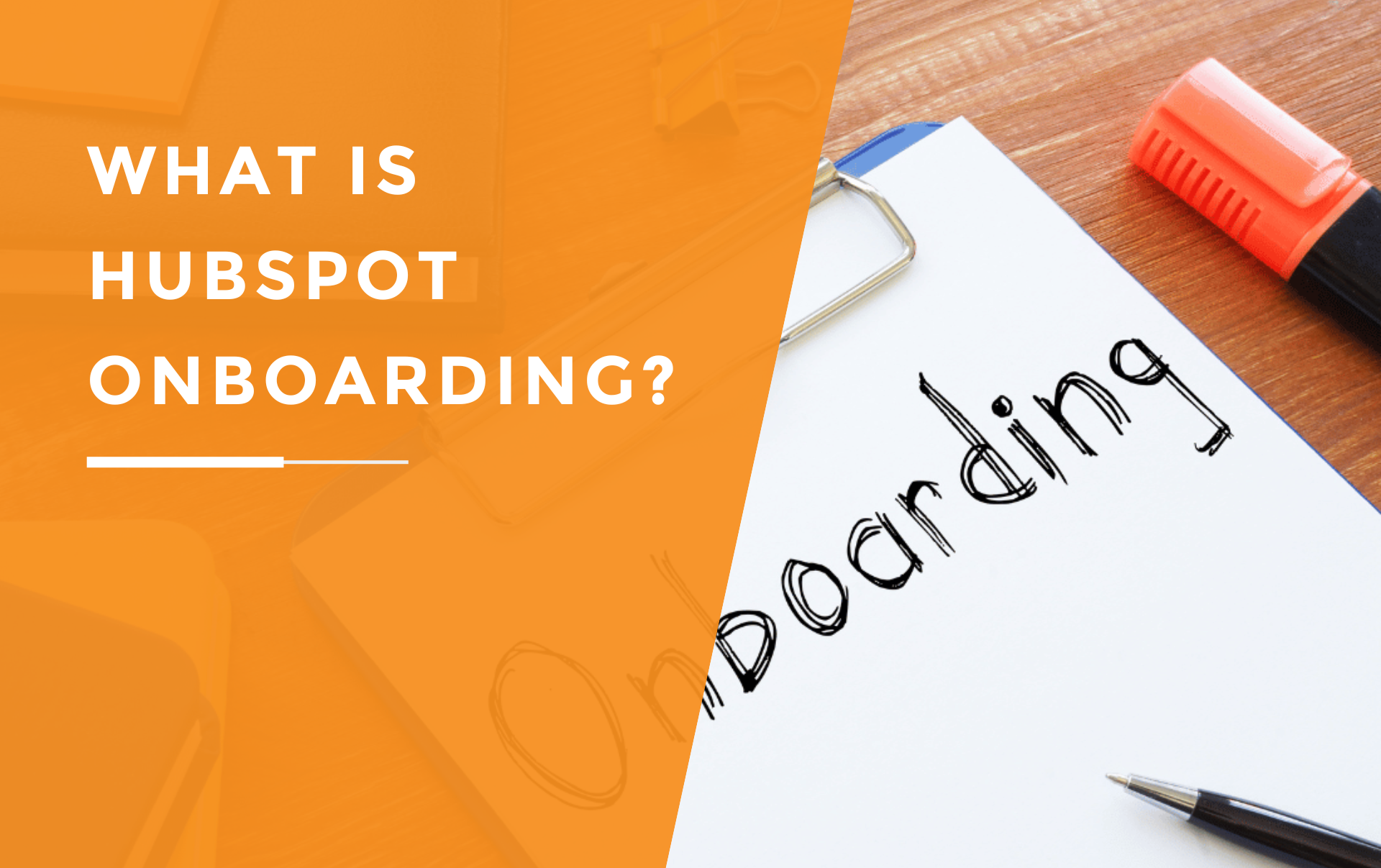 Onboarding written on a piece of paper on a wooden desk with a notebook.