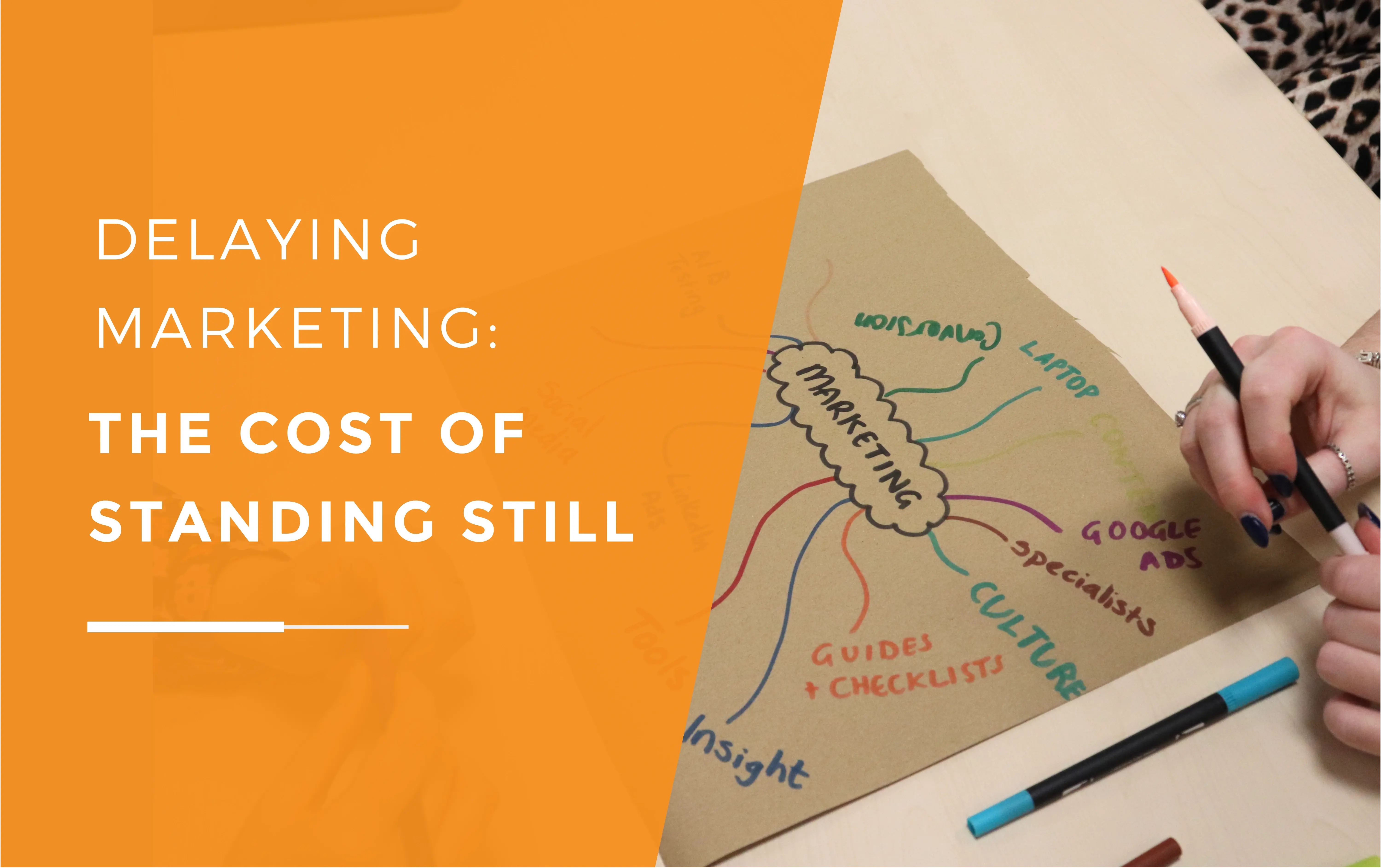 A mindmap drawn out on paper with lines leading off to topics about marketing which is the bubble in the middle.