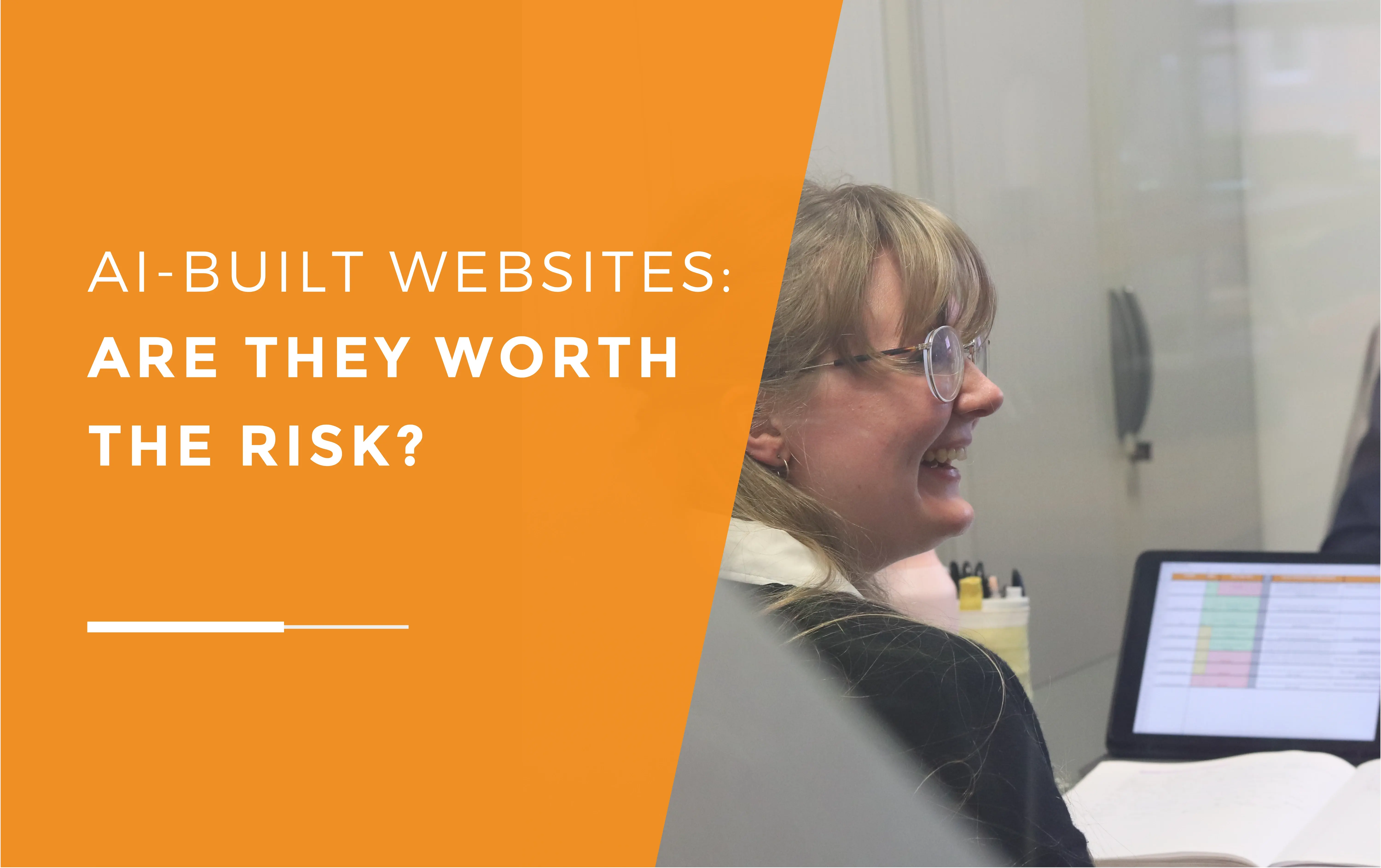 Emma in a meeting room laughing with her laptop open in front of her, discussing why not to build your website with ai.